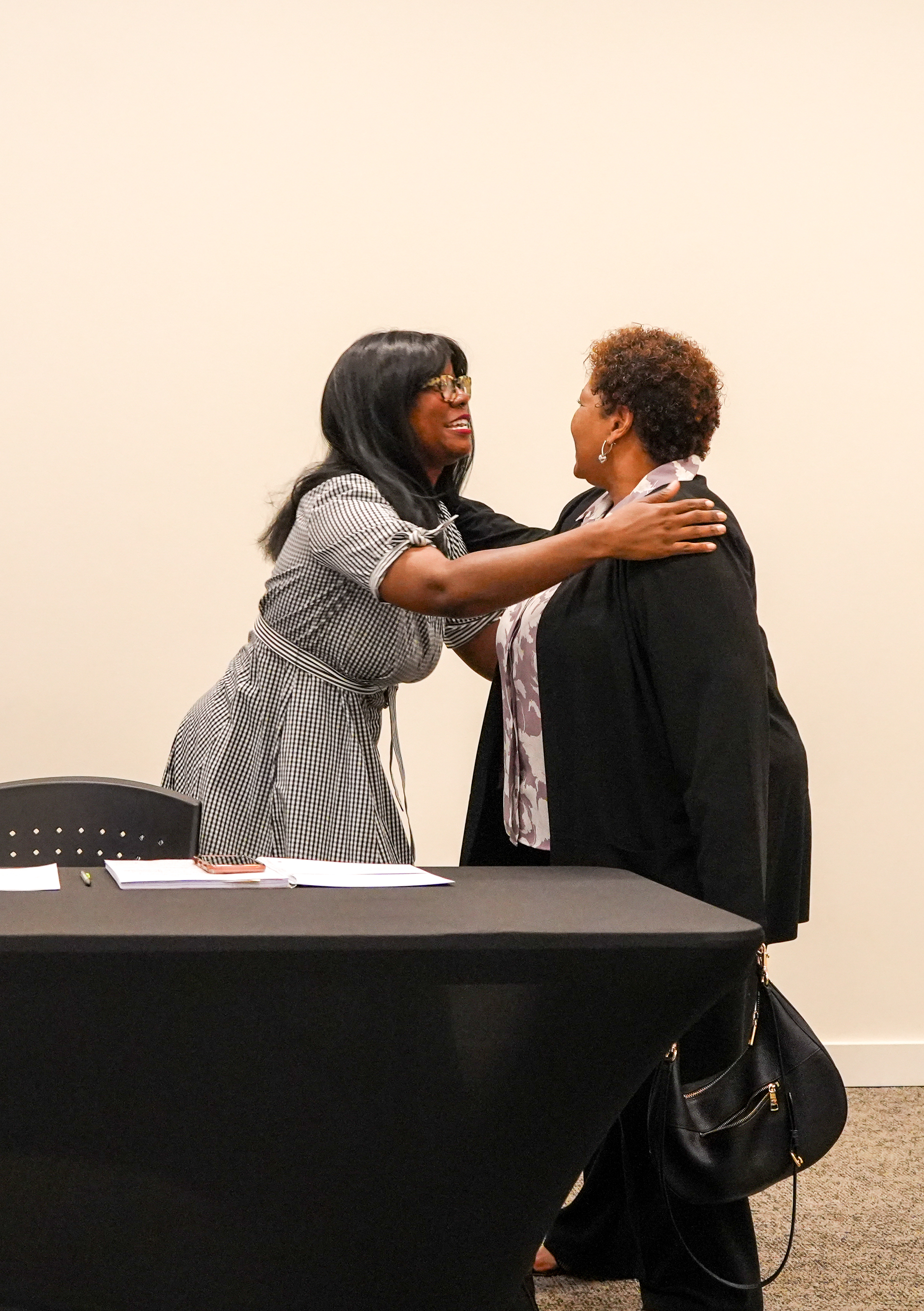 McNutt and Reena Evers-Everette embracing