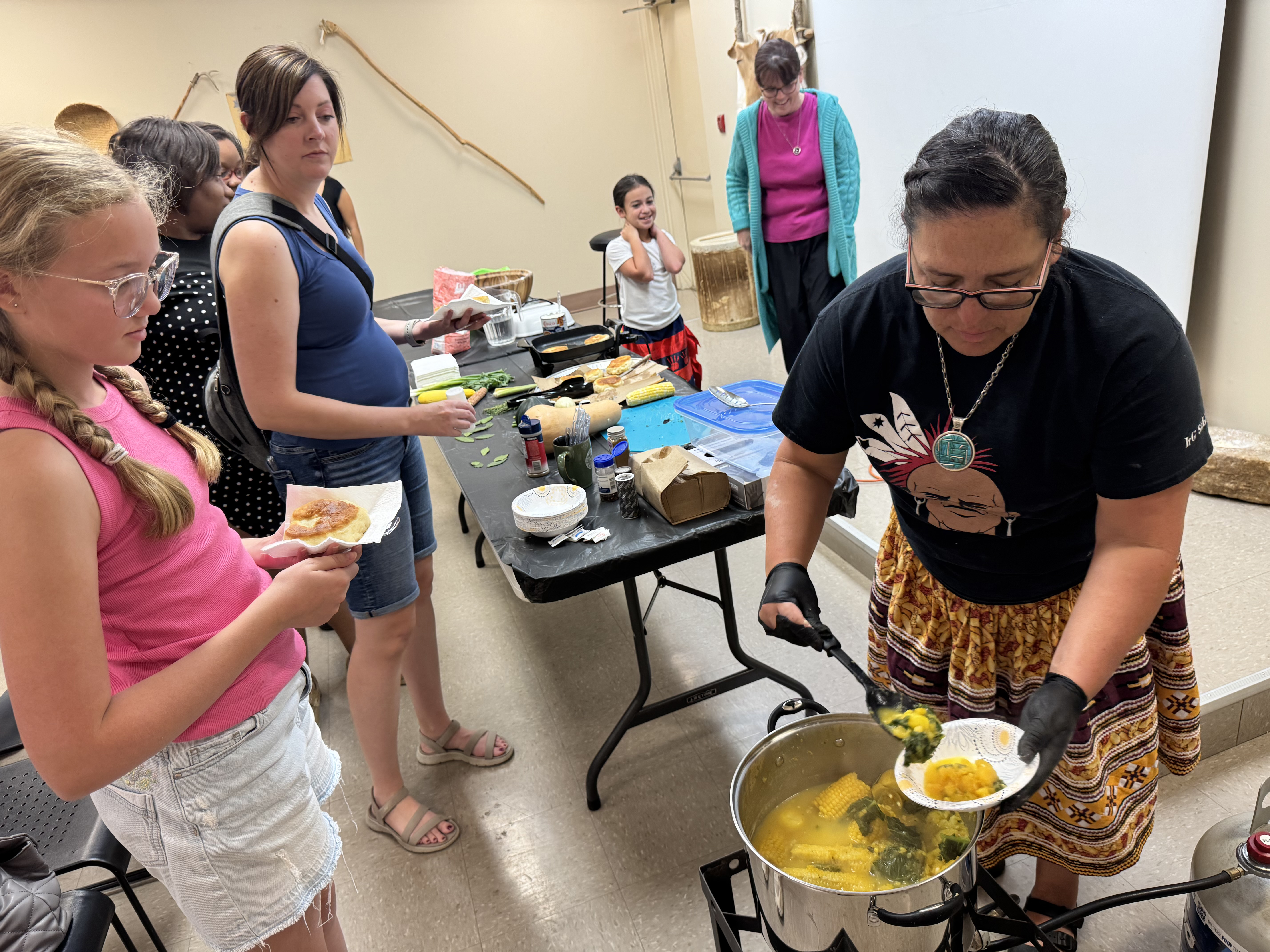 Rebekah Scott serves visitors