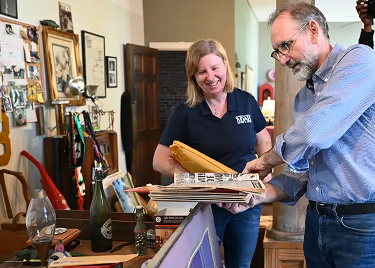 MDAH Employees examine donated items